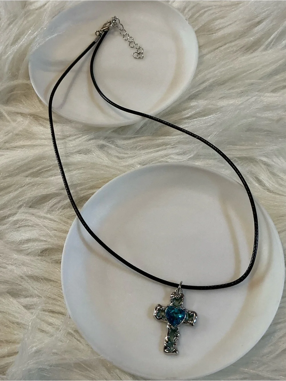 Pretty blue/silver-tone cross/religious pendant black string necklace